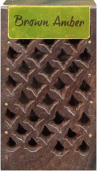Wooden box containing 5g of brown amber X3