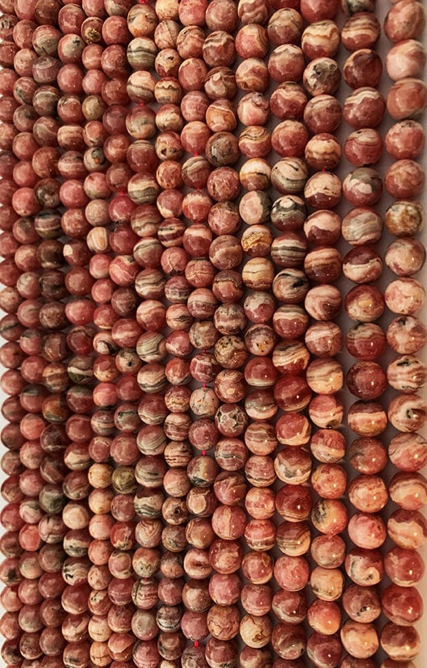 Rhodochrosite A 9mm pearls on string
