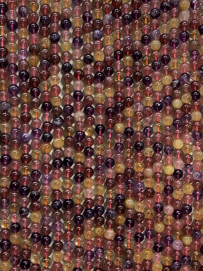 Super Seven A 8mm pearls on string