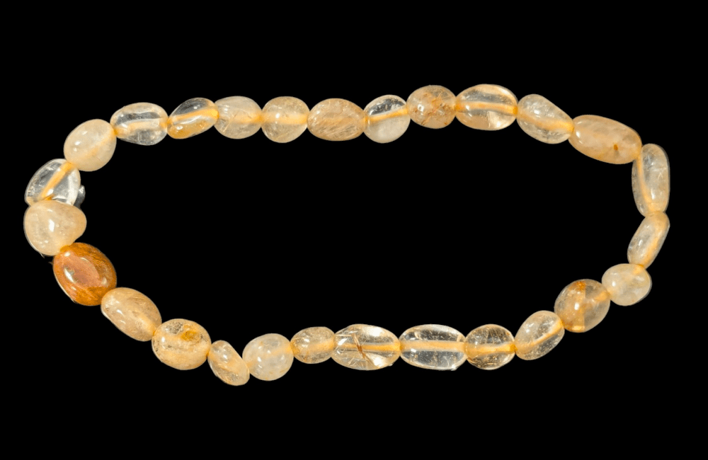 incense at A Rutile Rock Crystal Bracelet tumbled stones