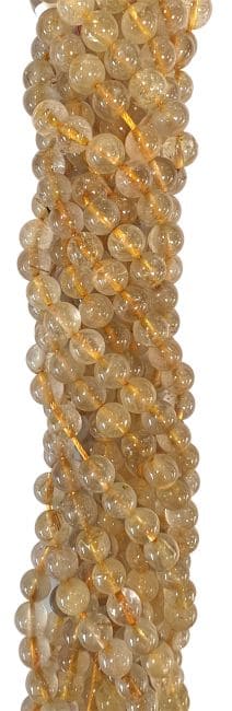 Rock Crystal Rutile A+ beads 7-8mm on 40cm wire