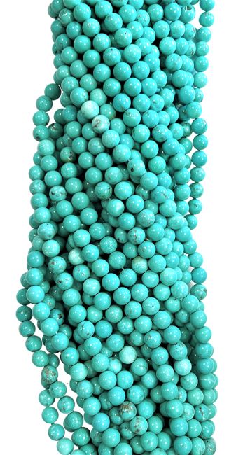 Turquoise natural tinted Howlite A 10mm pearls on string