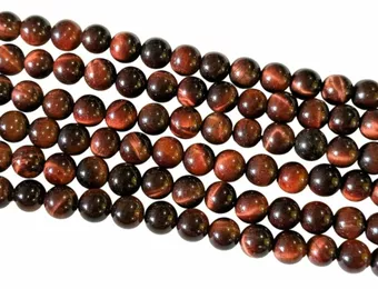 Bull's eye AA 6mm pearls on string