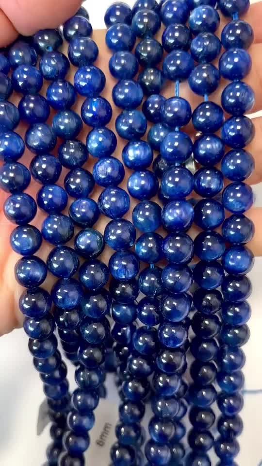Heated Blue Kyanite AA beads 8mm on a 40cm thread