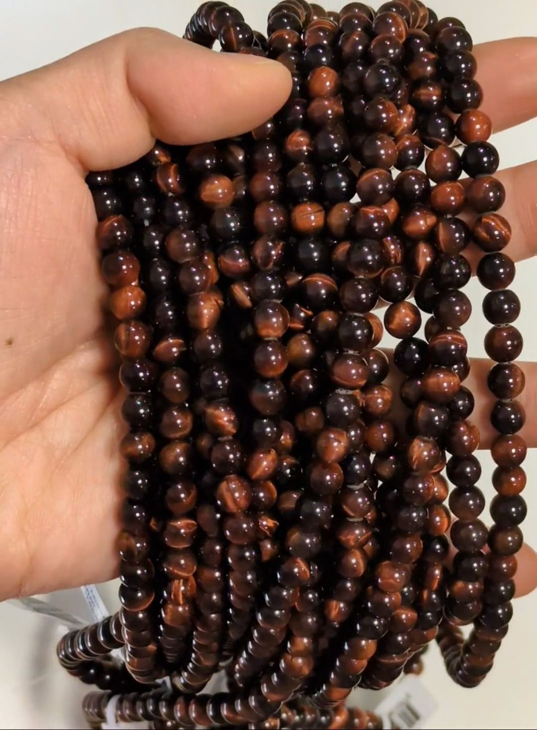 Bull's eye AA 6mm pearls on string