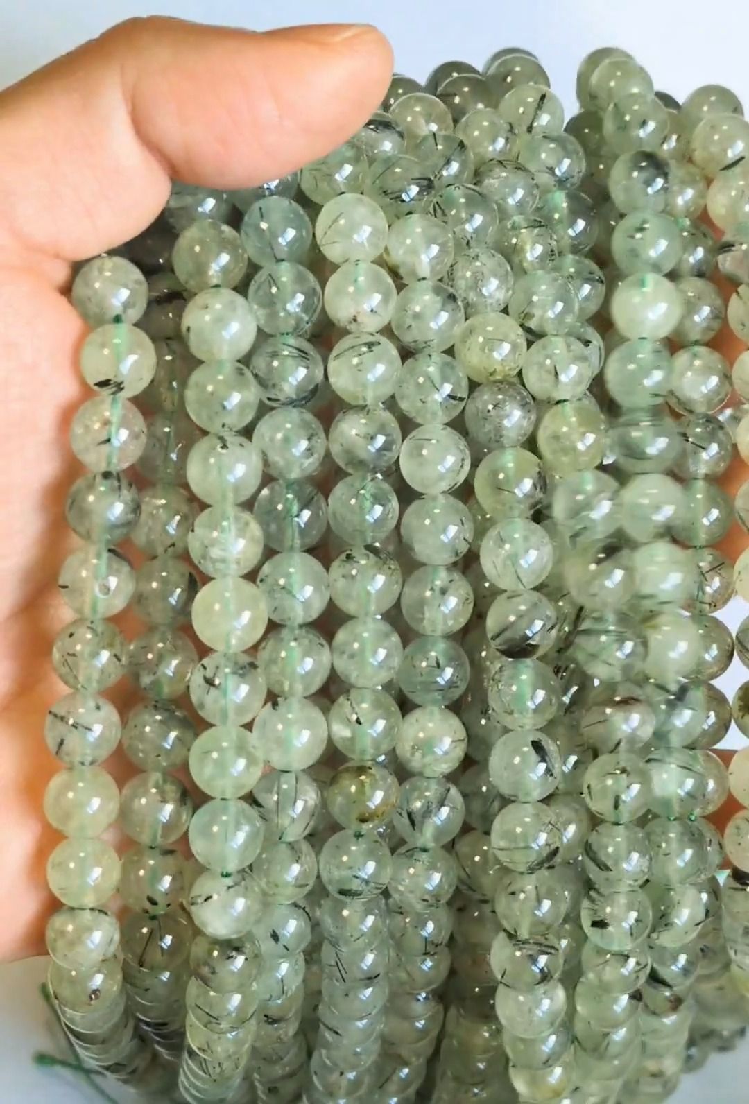 Prehnite A 8mm pearls on string