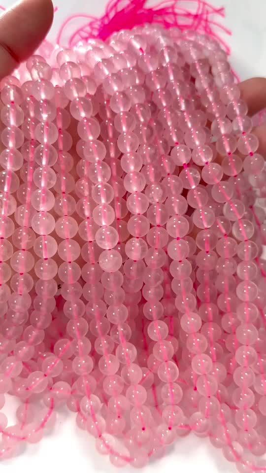 Rosequartz A 8mm pearls on string
